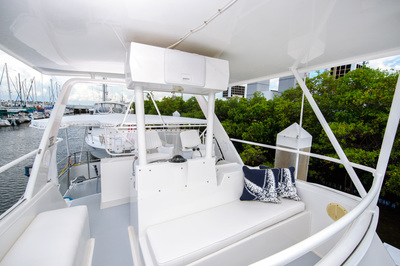 The view from the bridge of the 43' Viking is great! Your yacht captain will even let you take a turn at the helm! 